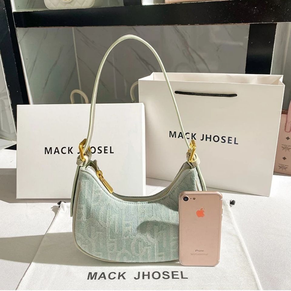 香港MackJhosel  PU小眾復古帆布法棍腋下包女秋夏2021新款單肩包
