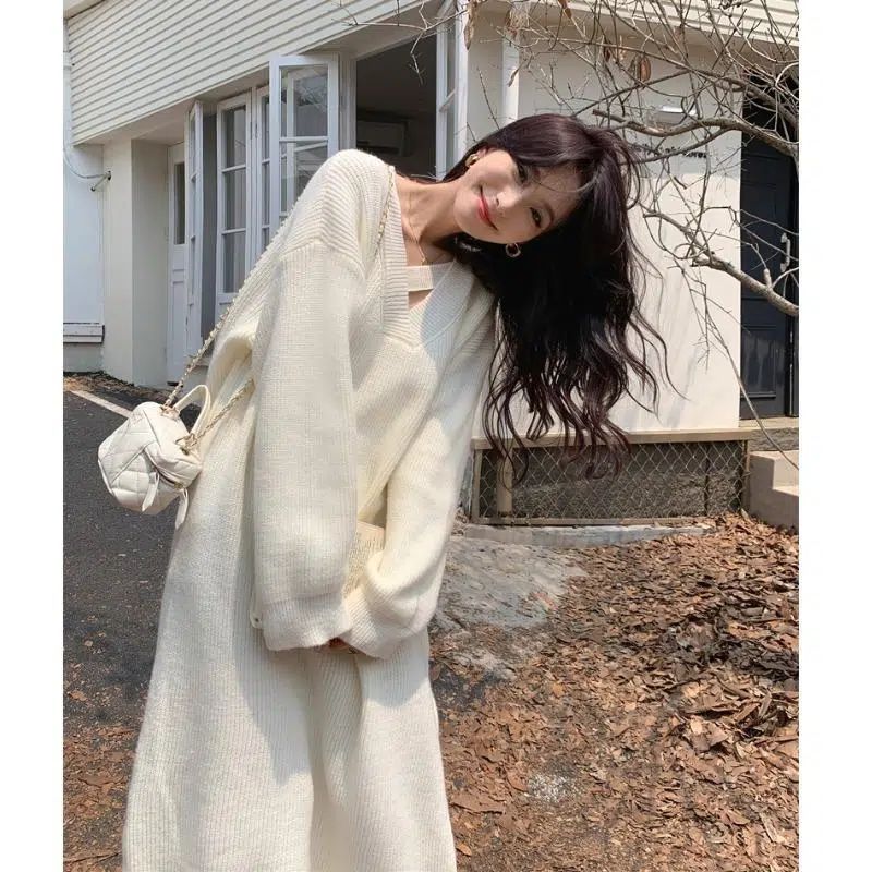 Autumn and winter dress women's knitted sweater long-sleeved V-neck temperament goddess style loose little French long skirt