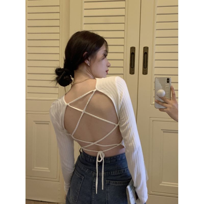 Sexy backless knitted small cardigan women's 2022 new autumn pure desire thin section bottoming design sense long-sleeved short top