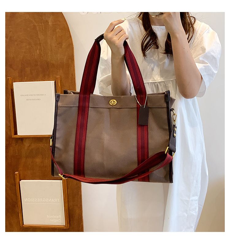FOUR ONE Fashion Women's 2023 New Canvas Niche Handheld Classroom Commuter Tote Cloth Crossbody Bag_voghion.com