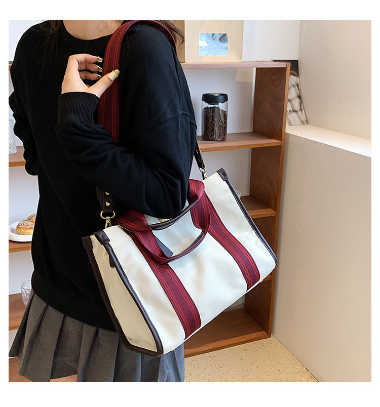 FOUR ONE Fashion Women's 2023 New Canvas Niche Handheld Classroom Commuter Tote Cloth Crossbody Bag_voghion.com