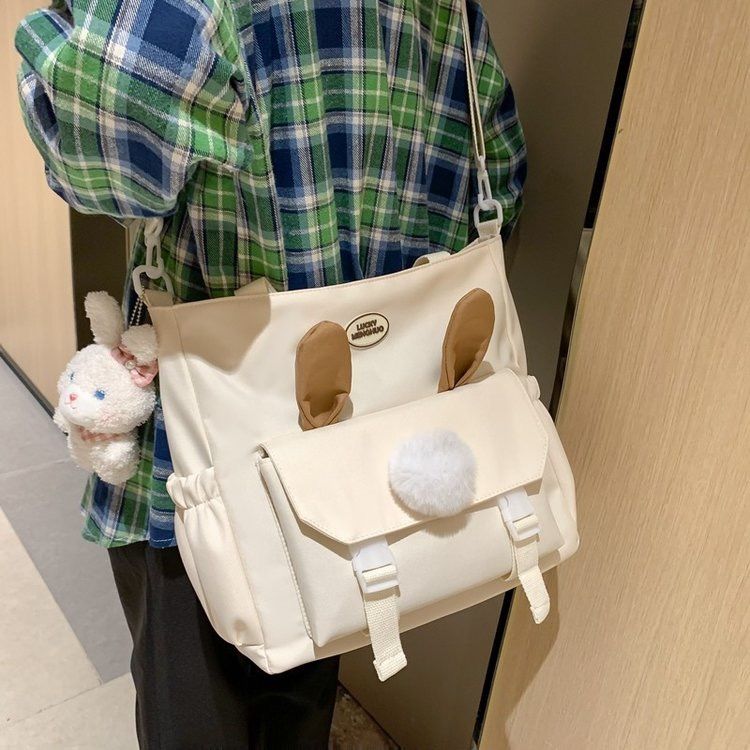 大容量包包女斜挎2023新款單肩包少女學生可愛兔耳朵高中生手提包