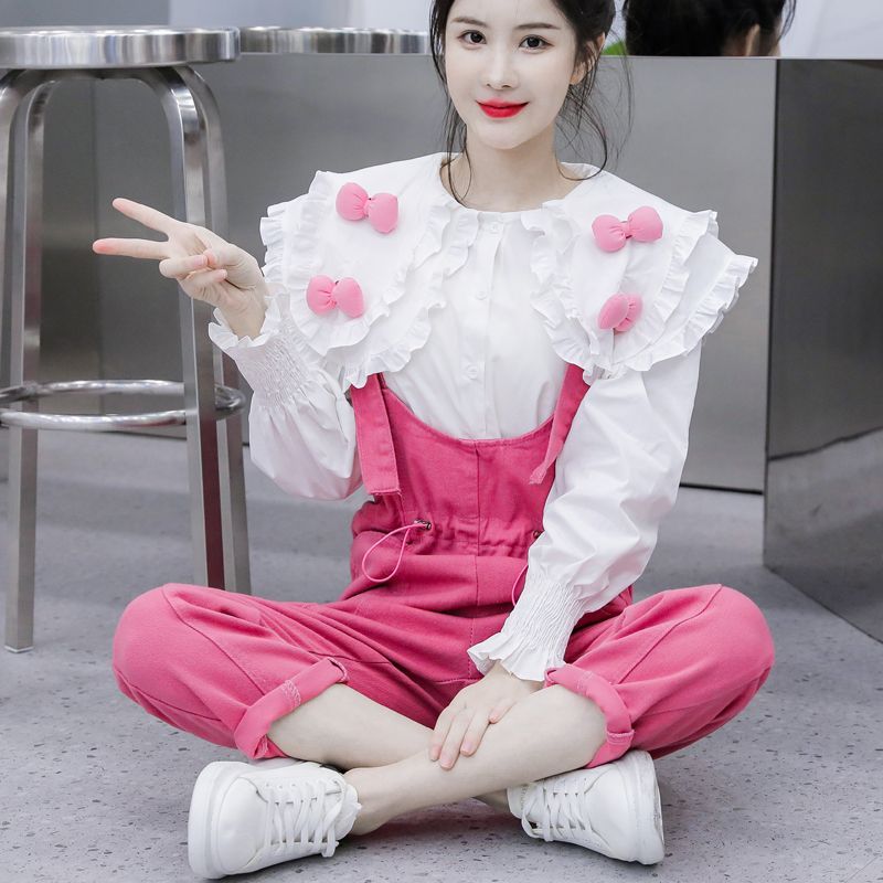韓版減齡玫紅色收腰牛仔背帶褲套裝女春季2023新款蝴蝶結娃娃襯衫