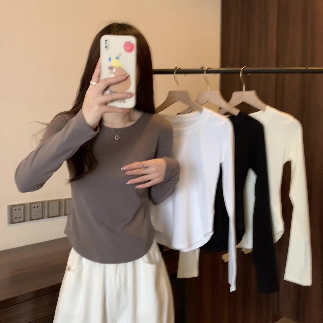 French pure desire short bottoming with foreign style long-sleeved t-shirt women's round neck design sense hot girl curved hem top