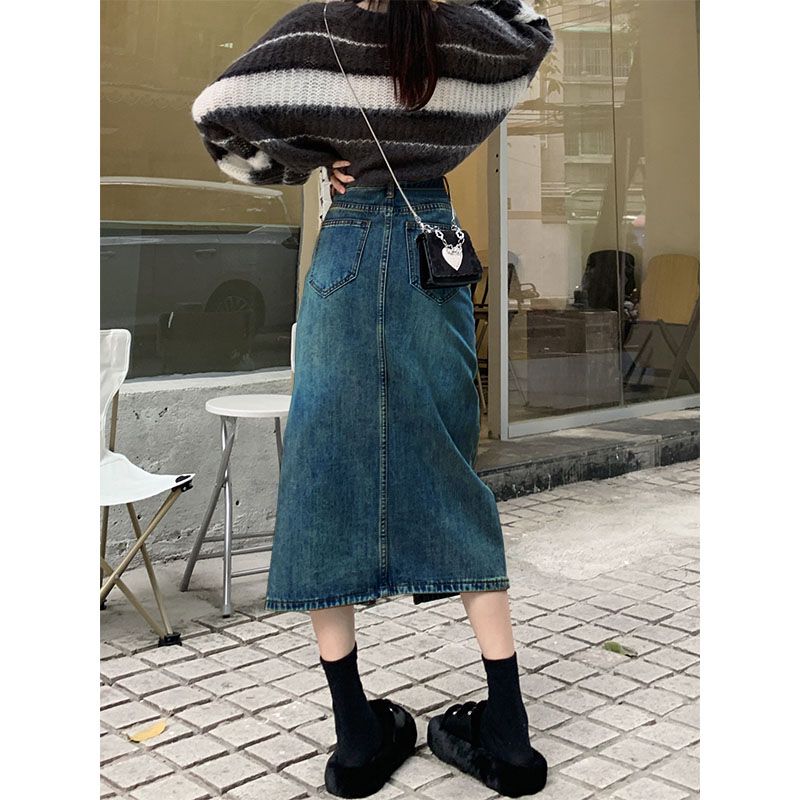 Spring new design sense niche high waist mid-length denim skirt women's front slit slim A-line bag hip skirt
