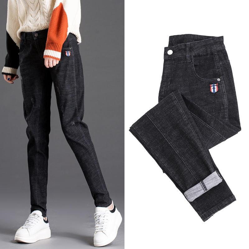 Nine points spring and autumn new harem jeans women's large size Korean version of carrot pants loose slim pants high waist trousers