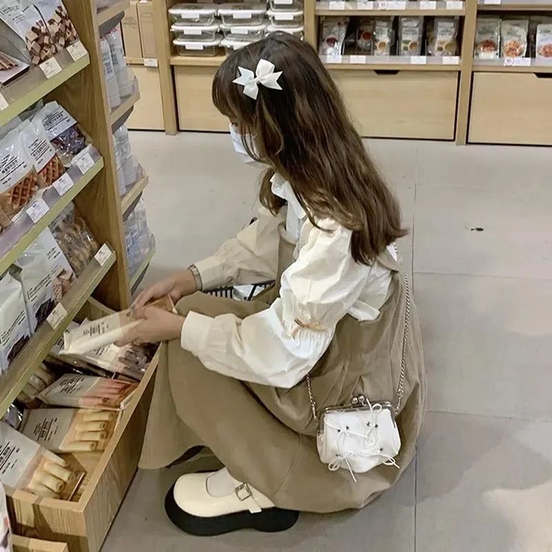 百褶背帶連衣裙女2023年新款春秋小眾設計感奶甜乖裙子溫柔兩件套