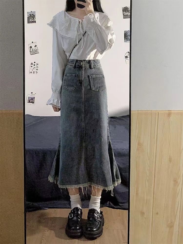 Hong Kong style 2023 spring and summer retro blue denim skirt women's high waist mid-length bag hip mermaid skirt raw edge