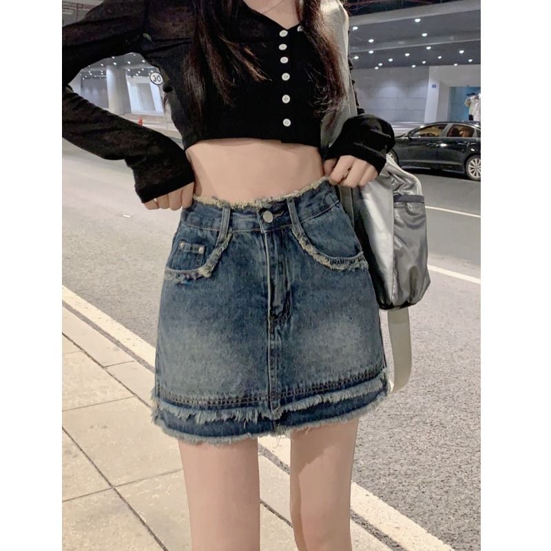 牛仔短裙女裝裙子2023年春季新款設計感小眾A字裙毛邊包臀半身裙
