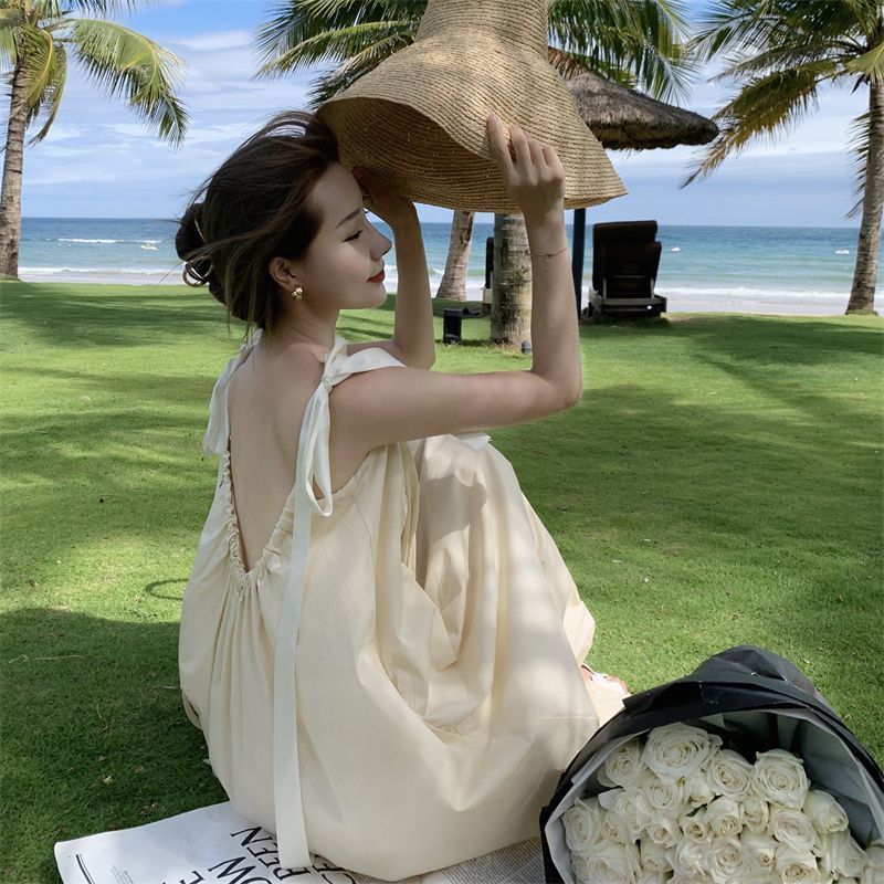 法式露背氣質吊帶夏季連衣裙女綁帶設計感不規則海邊度假沙灘長裙