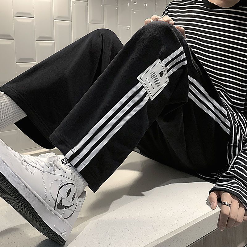 Casual pants men's spring new striped sports pants Hong Kong style loose new student trend straight trousers