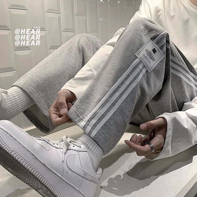 Casual pants men's spring new striped sports pants Hong Kong style loose new student trend straight trousers