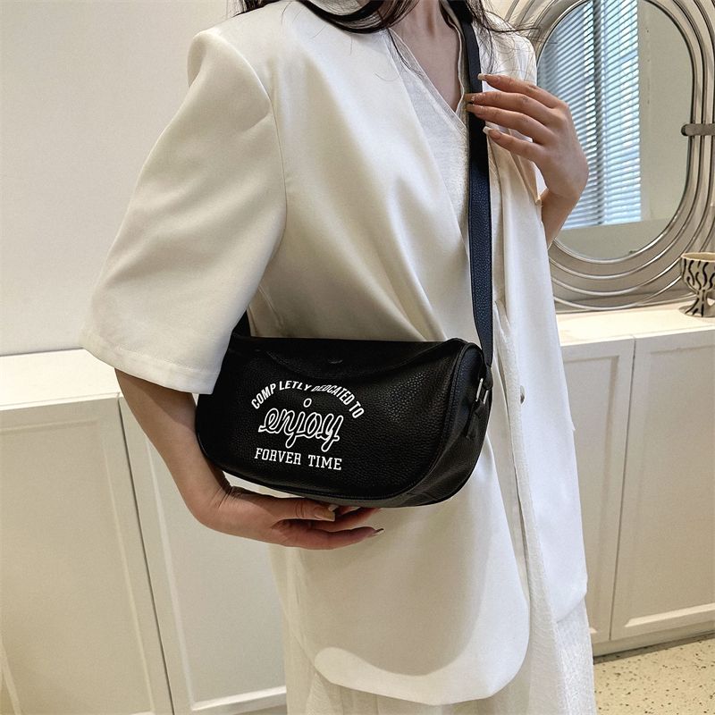 Versatile ins messenger bag female  new trendy Korean alphabet saddle bag student casual dumpling bag chest bag