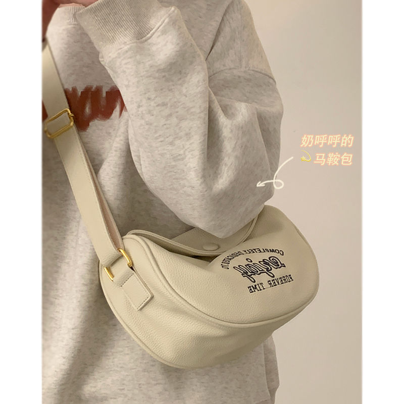 Versatile ins messenger bag female  new trendy Korean alphabet saddle bag student casual dumpling bag chest bag