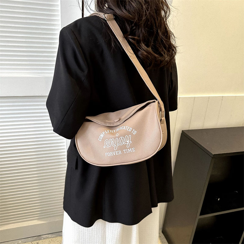 Versatile ins messenger bag female  new trendy Korean alphabet saddle bag student casual dumpling bag chest bag