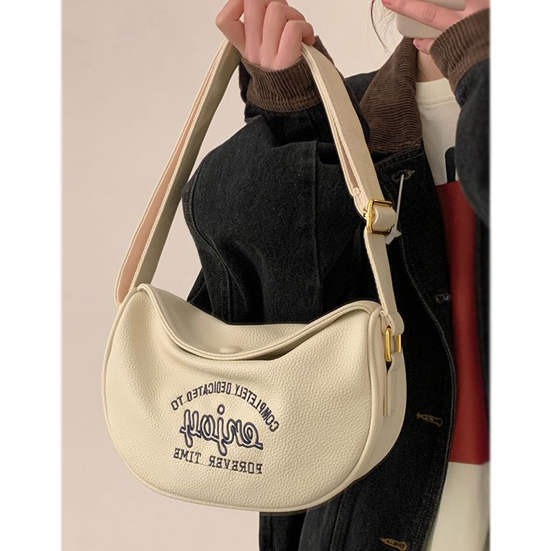 Versatile ins messenger bag female  new trendy Korean alphabet saddle bag student casual dumpling bag chest bag