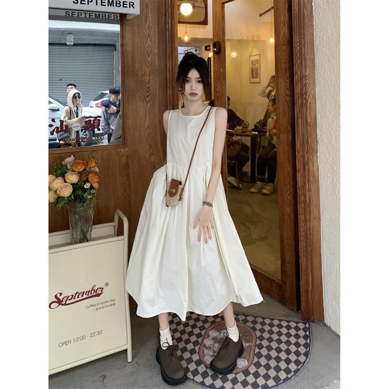 Sleeveless vest dress women's summer 2023 new French style white waist slimming mid-length fluffy swing skirt