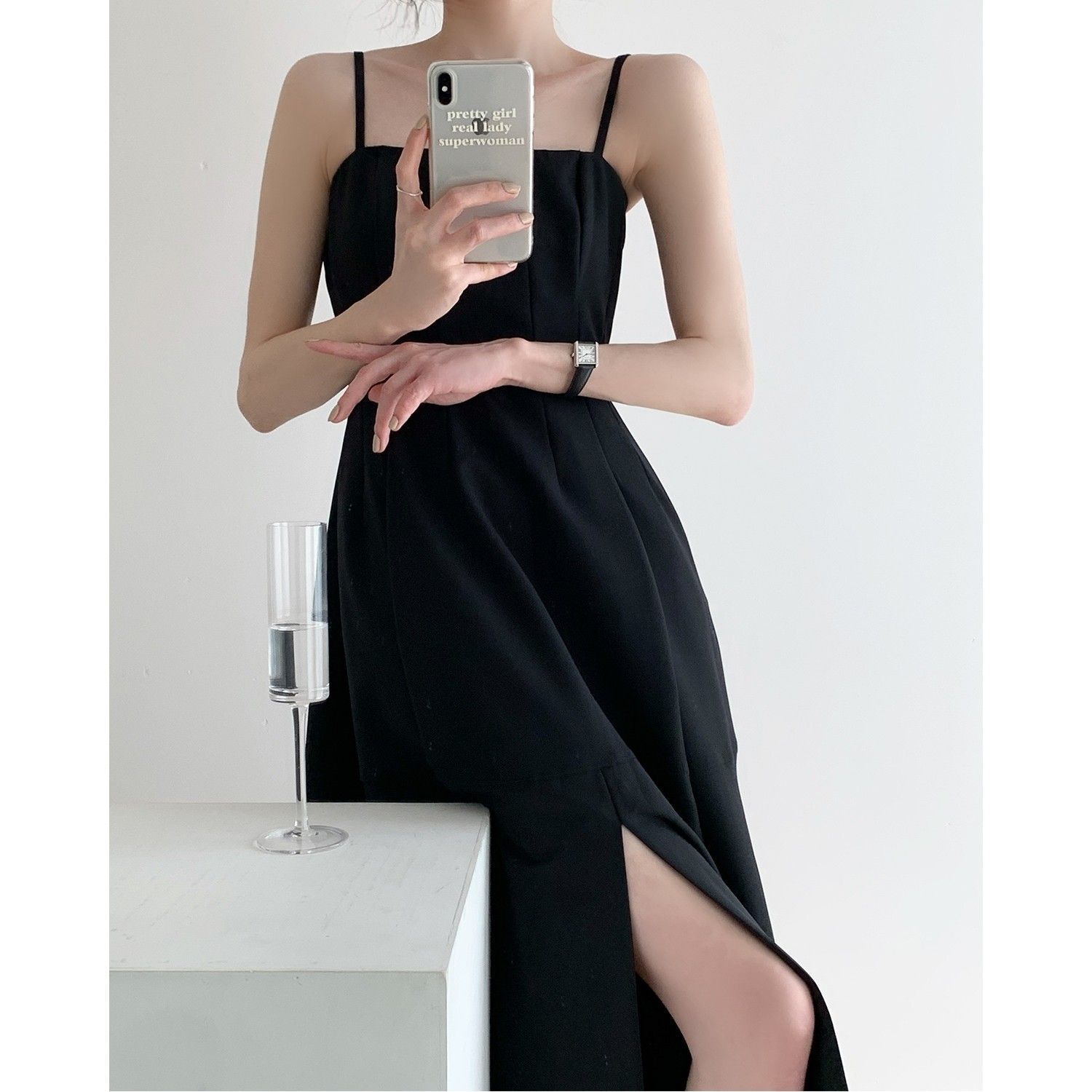 Black retro Hepburn style slit suspenders little black dress women's high-end French design sense niche high-waisted dress