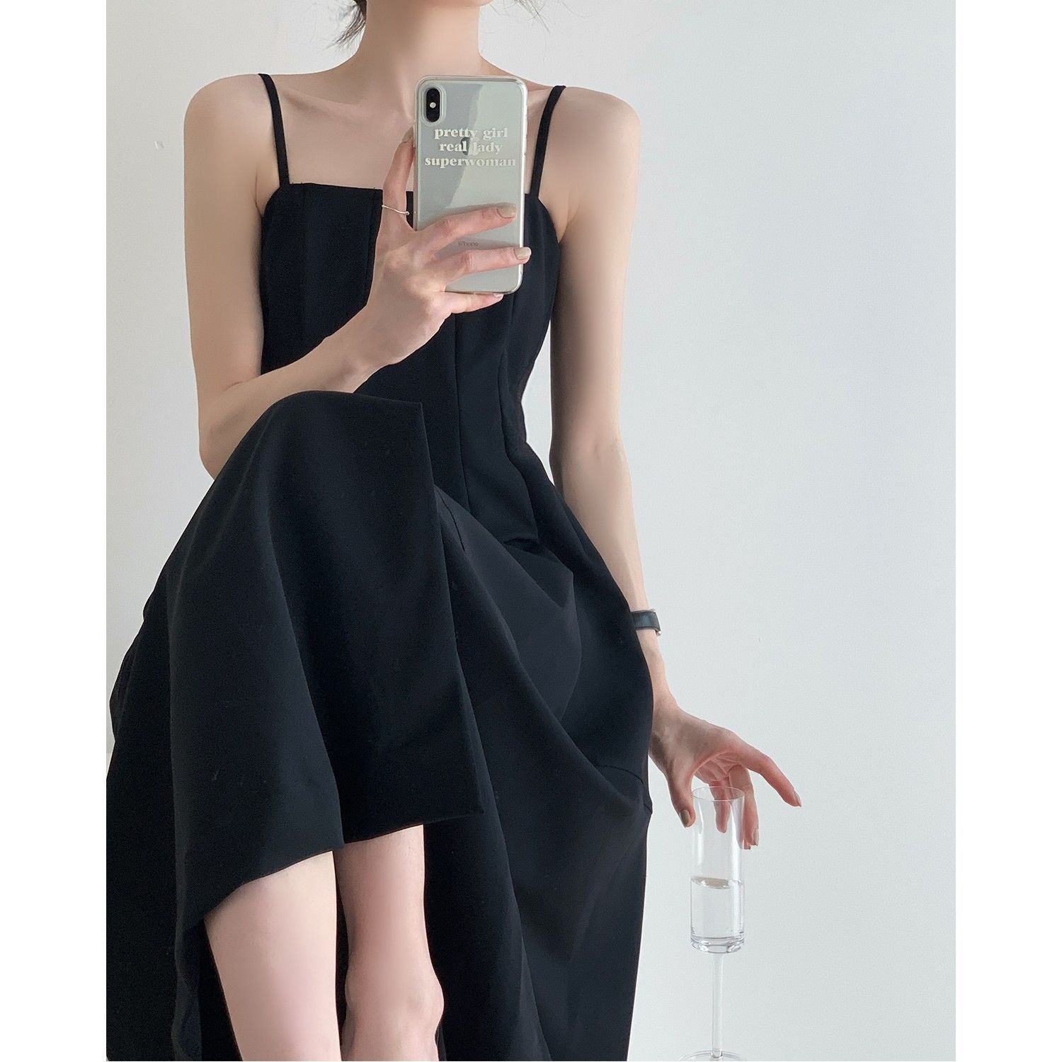 Black retro Hepburn style slit suspenders little black dress women's high-end French design sense niche high-waisted dress