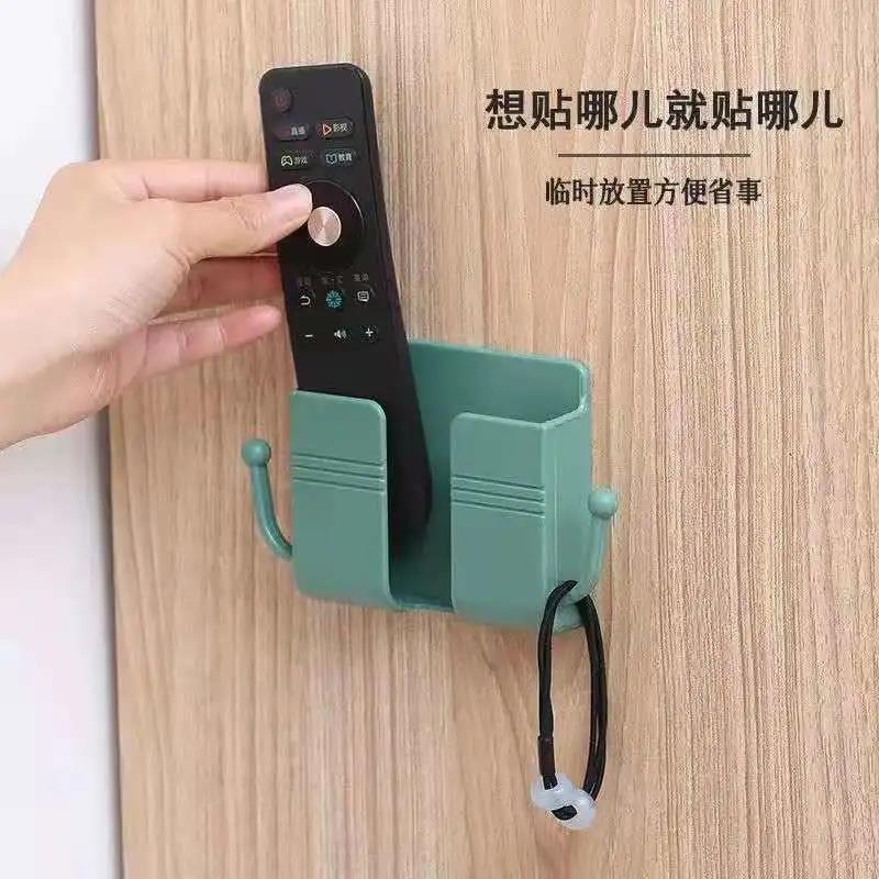 TV air conditioner remote control storage box multi-functional wall hanging bedside wall hanging mobile phone storage rack viscose