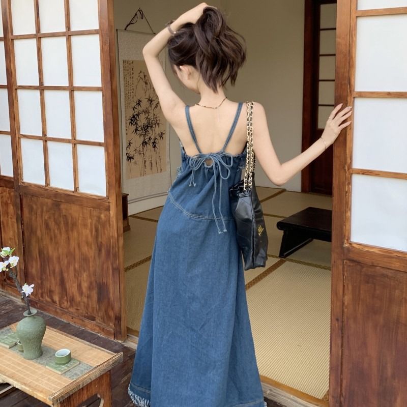 Manxiru early spring wear denim suspender skirt long section niche design sense fringe raw edge summer dress female