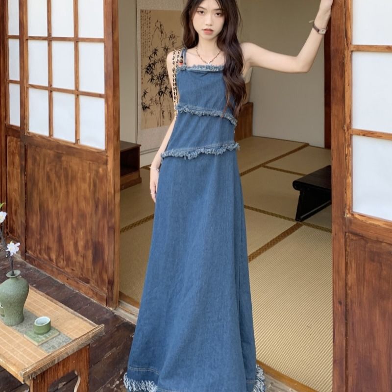 Manxiru early spring wear denim suspender skirt long section niche design sense fringe raw edge summer dress female