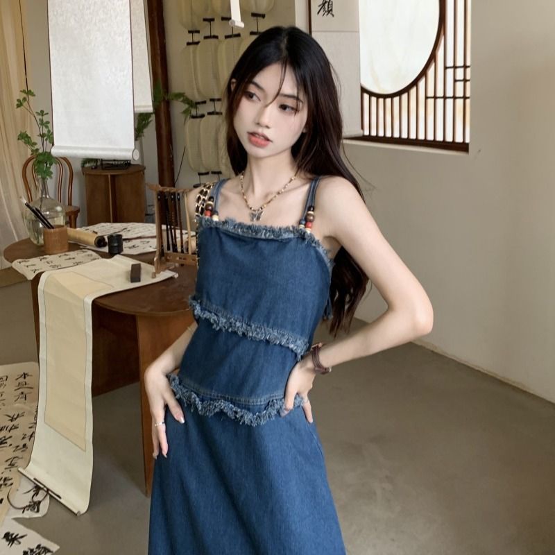 Manxiru early spring wear denim suspender skirt long section niche design sense fringe raw edge summer dress female