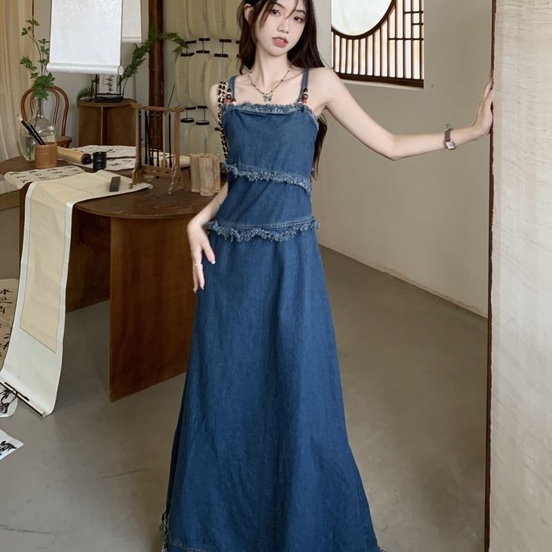 Manxiru early spring wear denim suspender skirt long section niche design sense fringe raw edge summer dress female