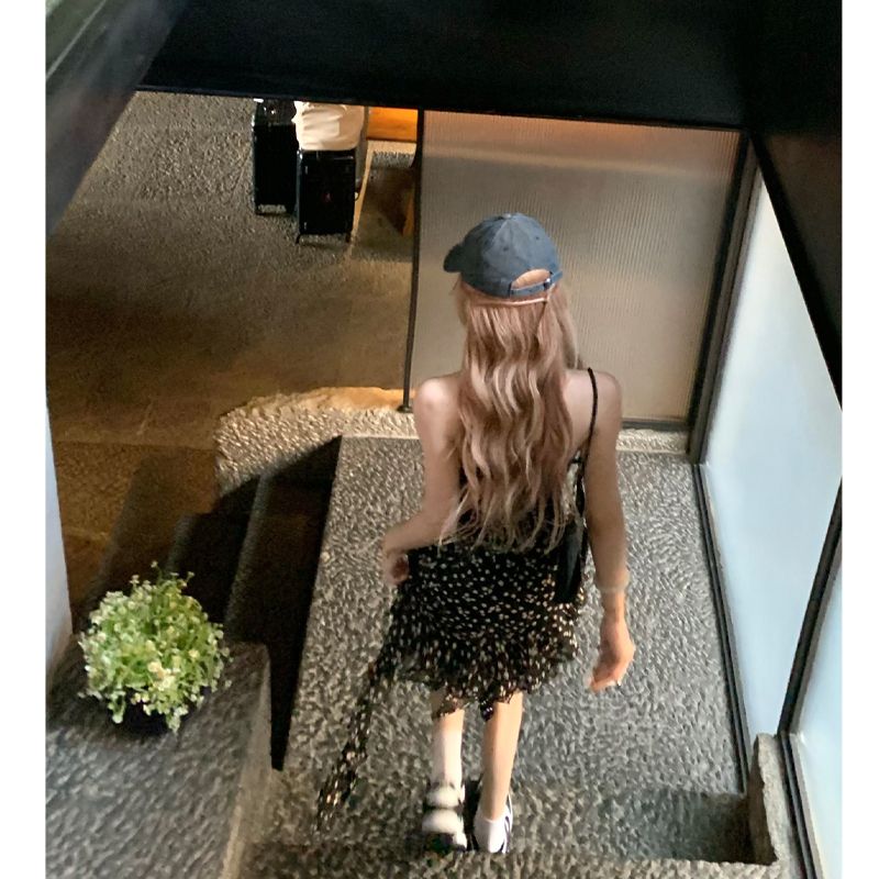 2023 summer new hot girl black floral skirt female vacation streamer irregular skirt cross suspender dress