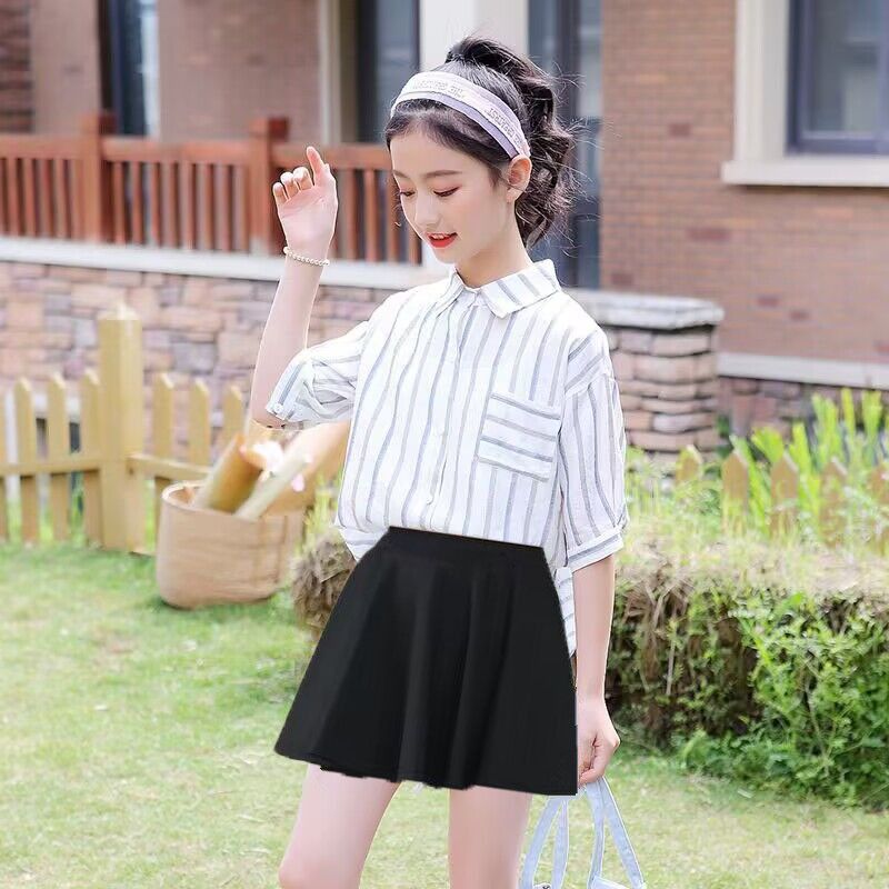 Girls' summer new Korean version of short skirts, foreign style, all-match little girls' skirts, primary school students' anti-light pleated skirts