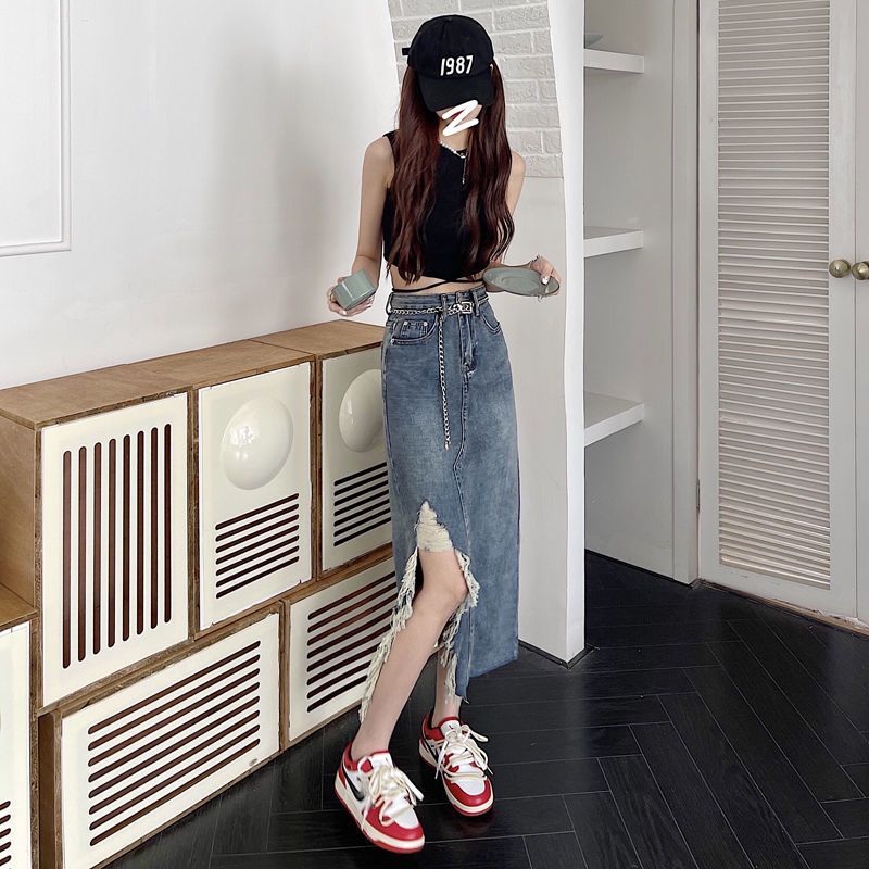 Design sense retro high waist irregular torn edge denim skirt women's summer thin bag hip a-line mid-length skirt trendy