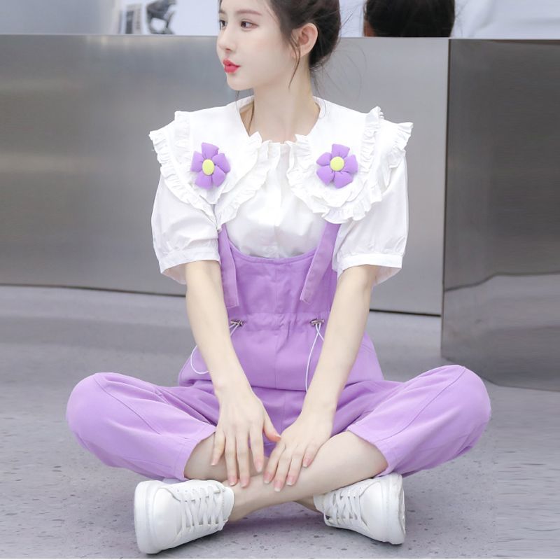 韓版新款減齡紫色束腰顯瘦牛仔背帶褲女花朵娃娃領襯衫套裝兩件套