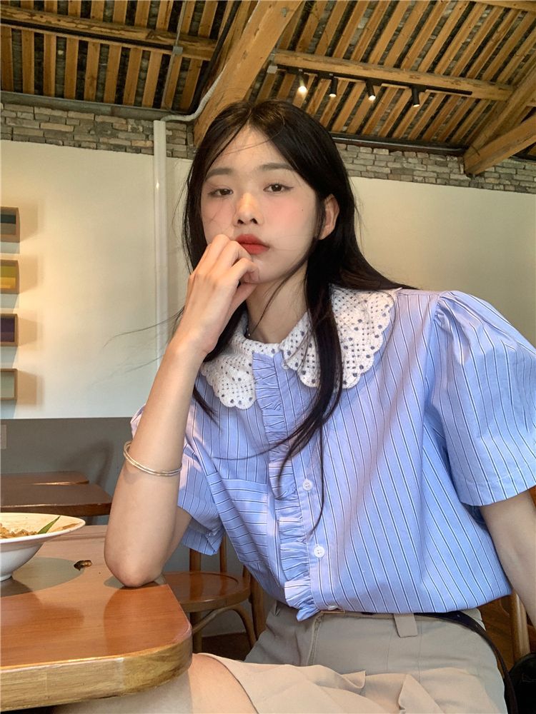 Korean retro hollow doll collar shirt age-reducing suit women's summer new temperament thin skirt two-piece set