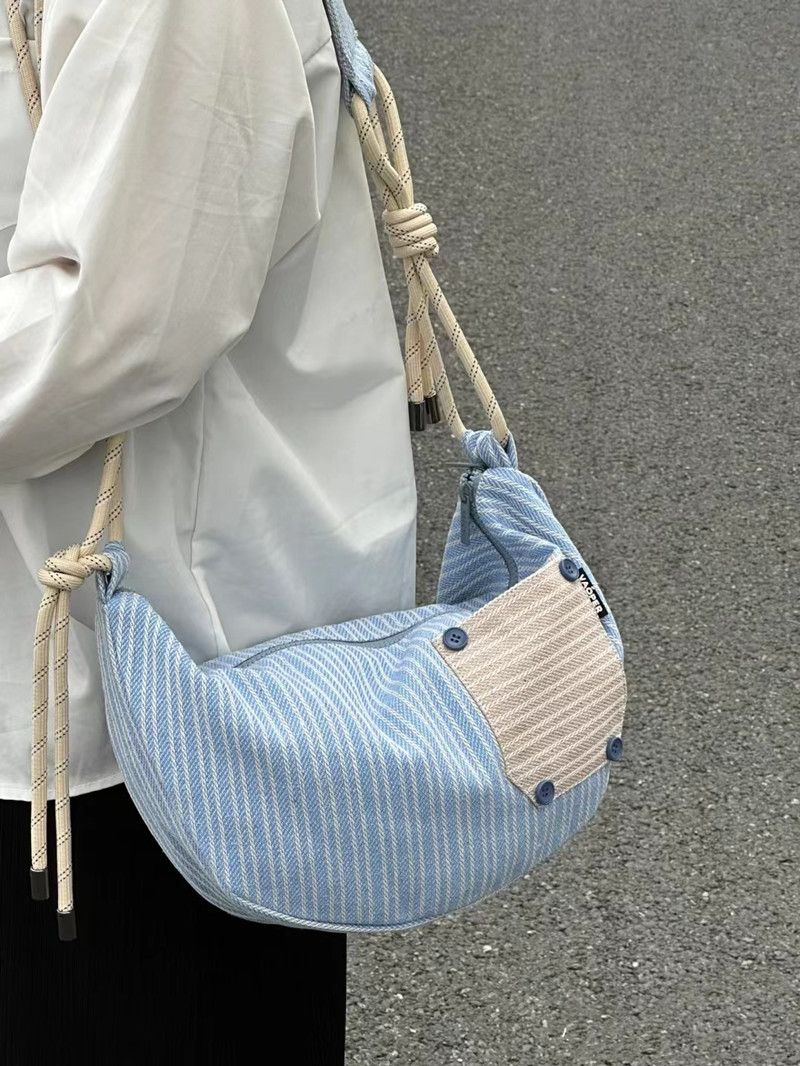 包包女2023新款藍白條紋餃子包休閒運動百搭單肩包大容量帆布包