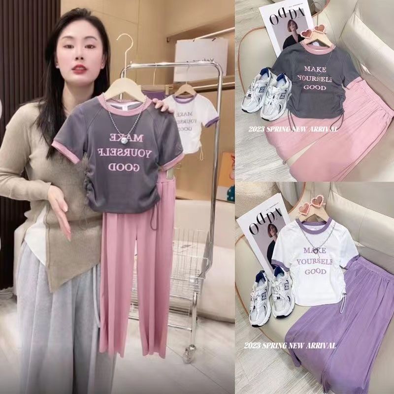 Girls' summer suit 2023 new children's Korean version of foreign style printed short-sleeved T-shirt big children's ice silk wide-leg pants