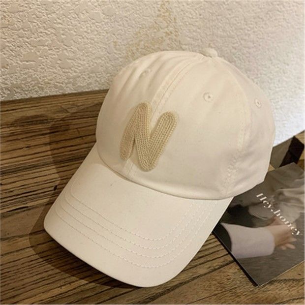 Baseball hat women's spring and summer big head around the face small couple Korean version of the wild alphabet sunscreen sunshade peaked cap male