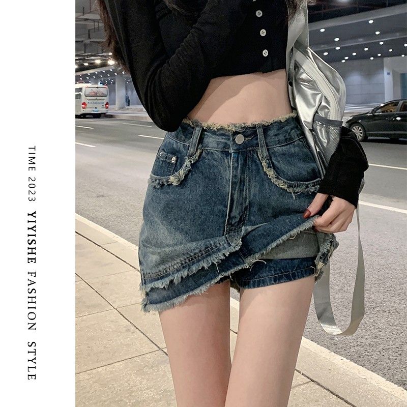 復古牛仔半身裙女2023春夏新款高腰顯瘦防走光a字毛邊包臀半身裙