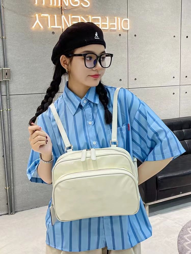JENNIE同款包包女夏2023新款可愛俏皮純色百搭休閒黑色雙肩小背包