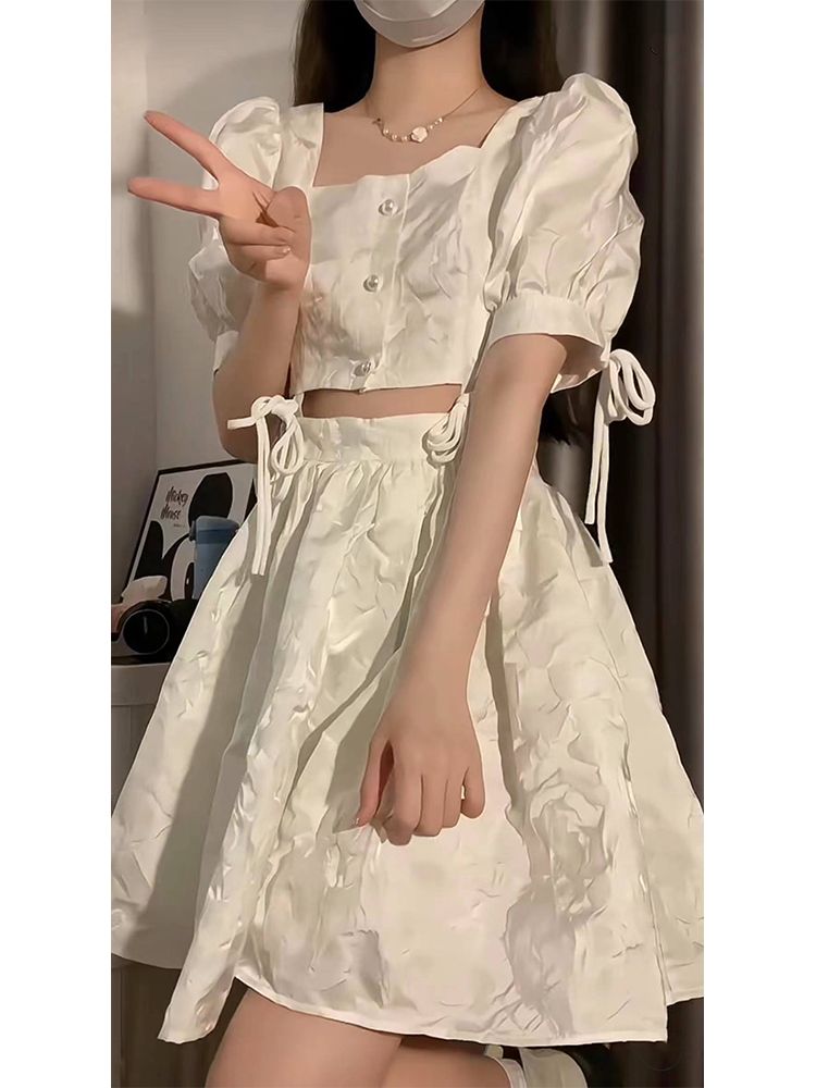夏季新款初戀小白裙甜美設計感假兩件露腰連衣裙女學生鏤空公主裙