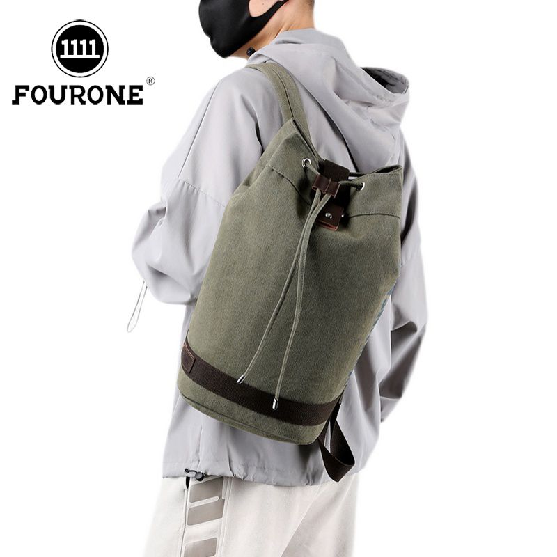 帆布背包男大容量双肩包旅行运动篮球包大学生书包水桶包