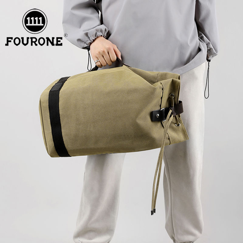 帆布背包男大容量双肩包旅行运动篮球包大学生书包水桶包