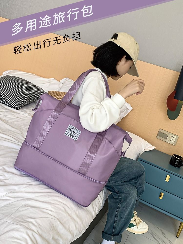 大容量手提短途旅行包女時尚潮流防水行李包男出差旅遊收納登機包