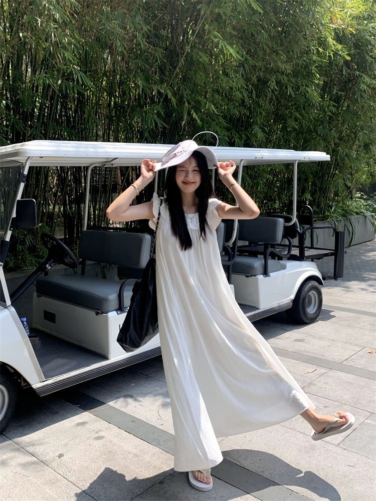 Holiday style white strappy flying sleeve dress women's summer  new temperament loose slim mid-length skirt