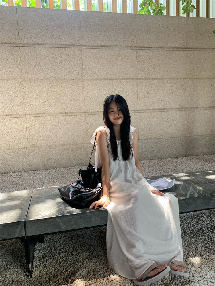Holiday style white strappy flying sleeve dress women's summer  new temperament loose slim mid-length skirt