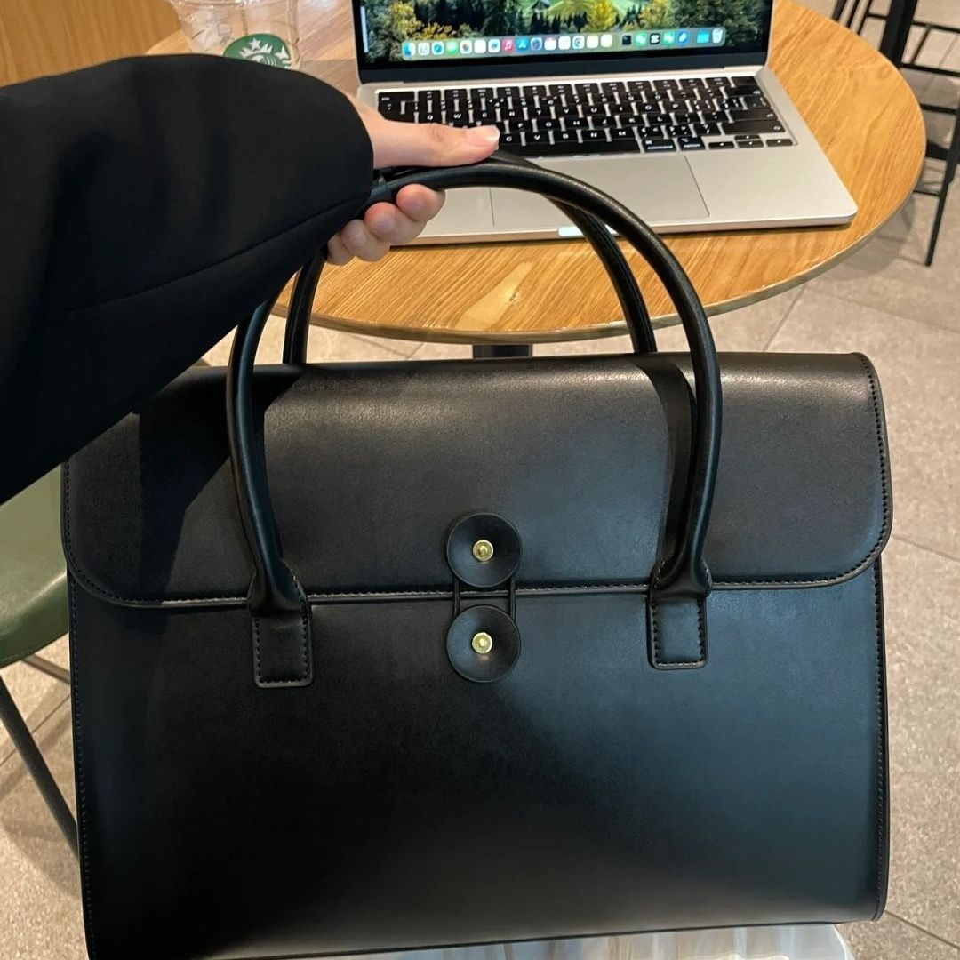 14-inch computer bag female high-value design sense can put the mouse charger light luxury high-end business documents...