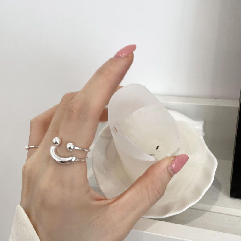 Korean smiling face ball ring women's index finger niche design light luxury high-end fashion personality ins trend ring