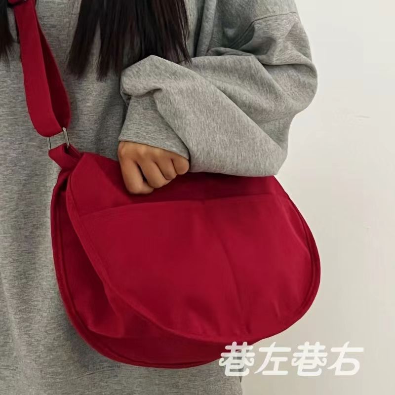 尼龍帆布包包女大容量新款百搭餃子包大學生上課單肩斜挎包時尚潮