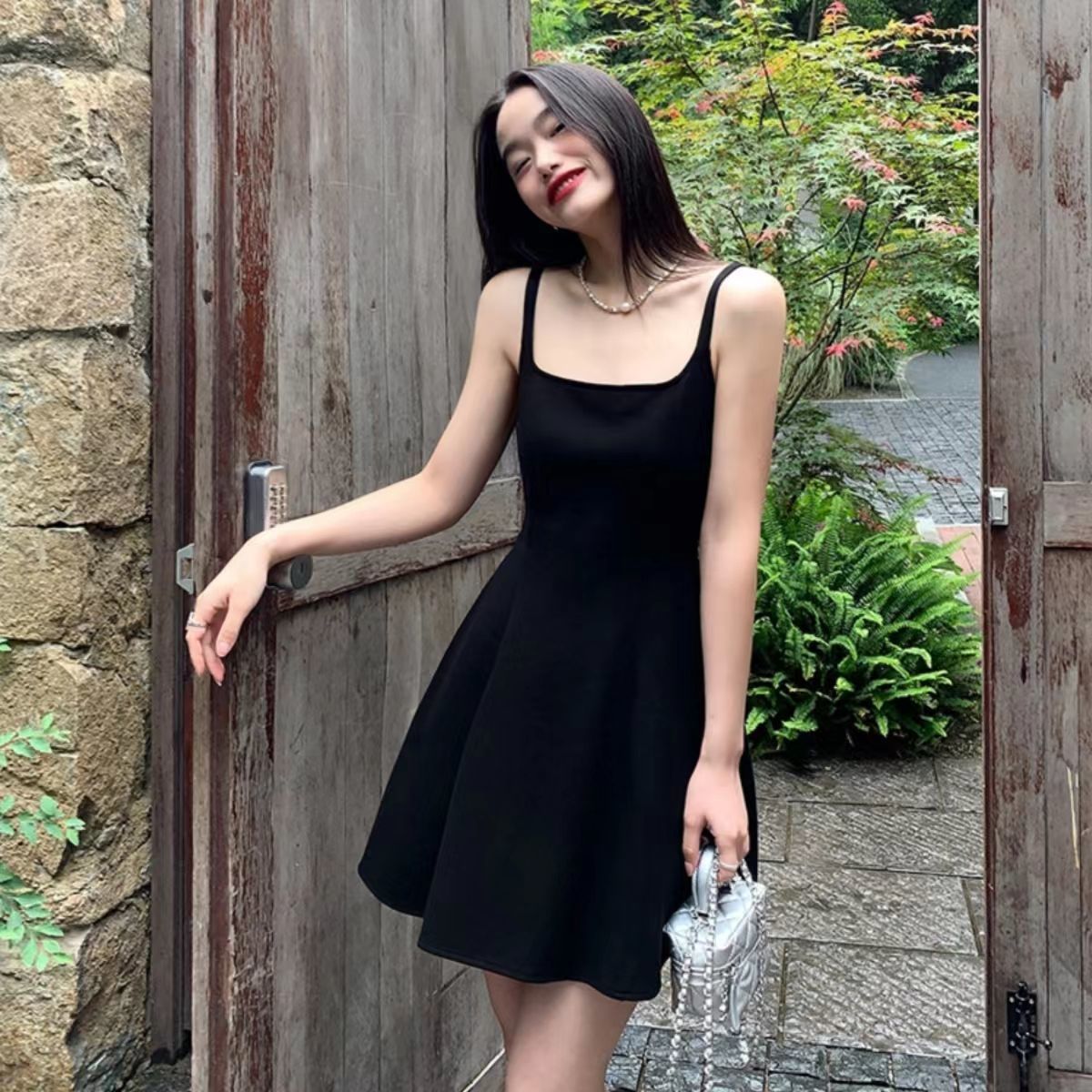 Black suspender dress women's summer 2023 new Korean version slim a-line skirt high-end temperament waist skirt