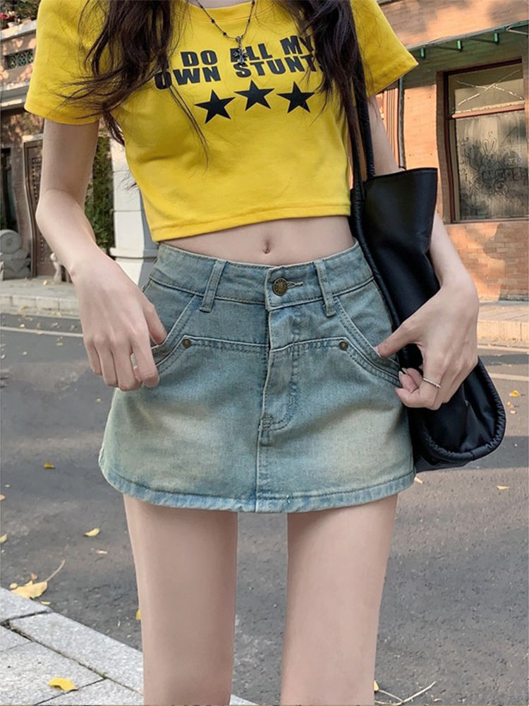 Retro vintage vintage denim skirt pants for women's autumn new anti glare high waistband buttocks show thin A-line ultra short skirt
