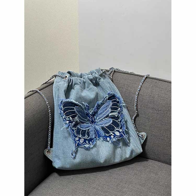 原創蝴蝶結流蘇牛仔鏈條雙肩包簡約刺繡撞色流浪牛仔手提包